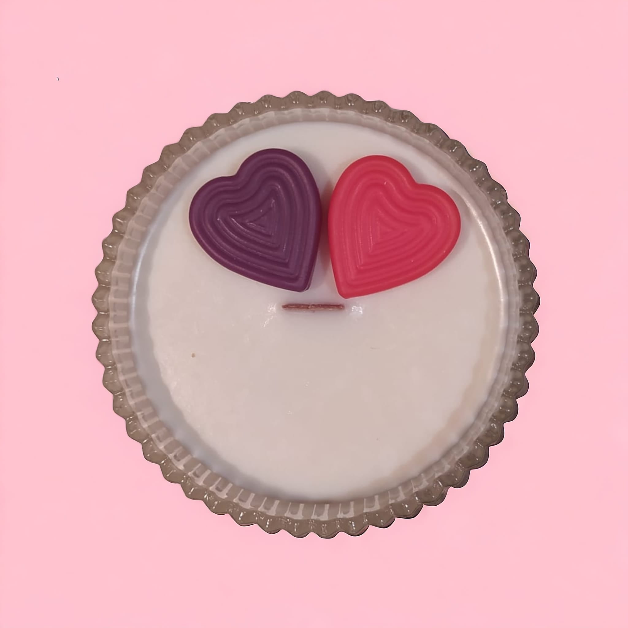 Dwa cukierkowe serca podłużne - czerwone i fioletowe